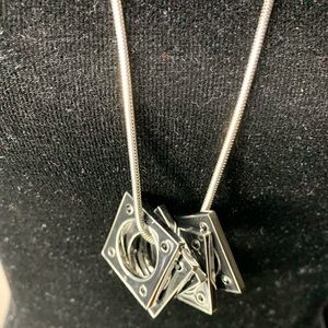 16 in silver necklace with 5 square circles